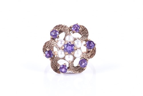 Lot 329 - A late 1960s 9ct yellow gold, amethyst, and...