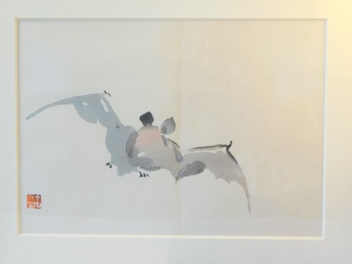 Lot 548 - A japanese woodblock print of a bat in flight,...