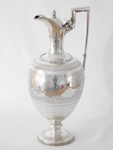 Lot 453 - A Victorian silver lidded ewer, Martin, Hall &...