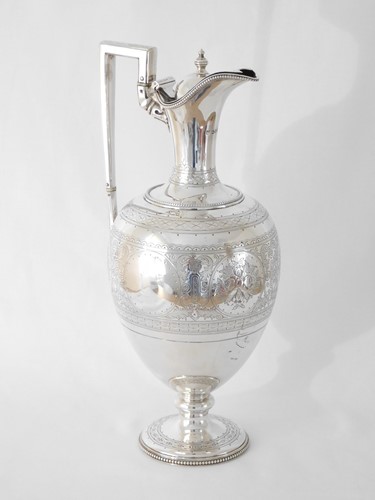 Lot 453 - A Victorian silver lidded ewer, Martin, Hall &...