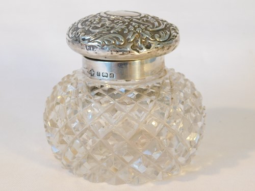 Lot 446 - An Edwardian cut glass and silver mounted...