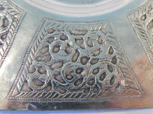 Lot 447 - A Continental Arts & Crafts style silver dish,...
