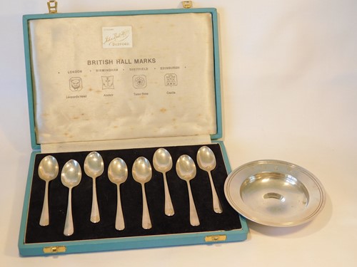 Lot 452 - A set of eight 'British Hallmarks' silver...