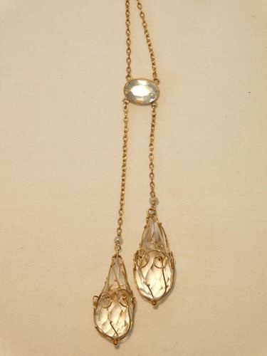 Lot 351 - A 9ct gold necklace with faceted pendant drops,...