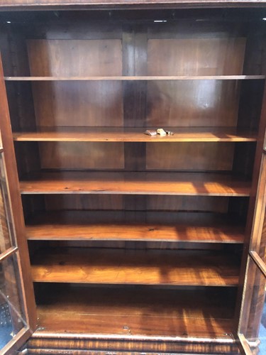 Lot 131 - A large 19th century flame mahogany bookcase,...