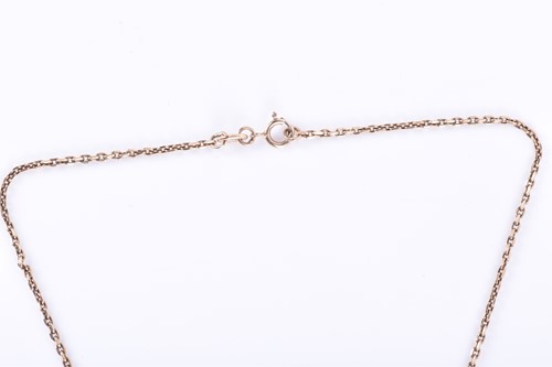 Lot 181 - A yellow metal and synthetic corundum pendant,...