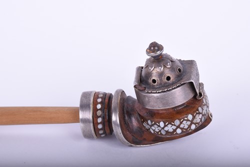 Lot 487 - A small Tibetan tobacco pipe, with white metal...