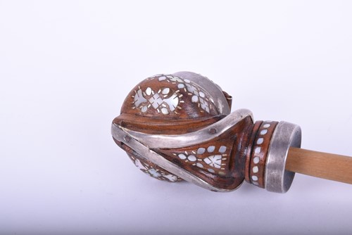 Lot 487 - A small Tibetan tobacco pipe, with white metal...