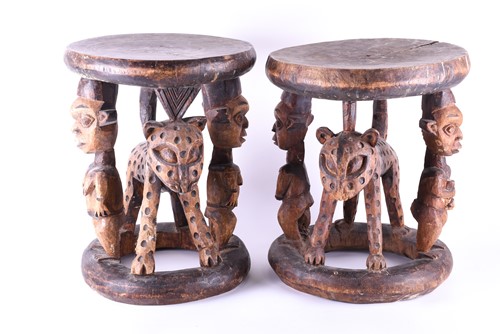 Lot 401 - A near pair of African tribal art carved wood...