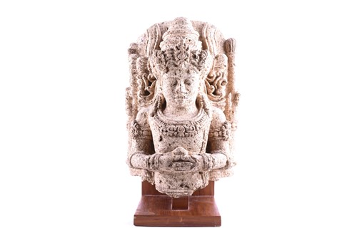 Lot 255 - A South East Asian carved stone bust of...