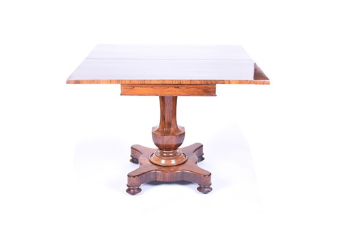 Lot 151 - A Regency foldover tea table, the figured...