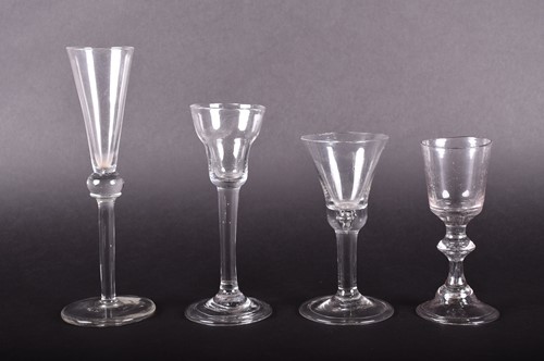 Lot 442 - Two mid-18th century wine glasses, one with...