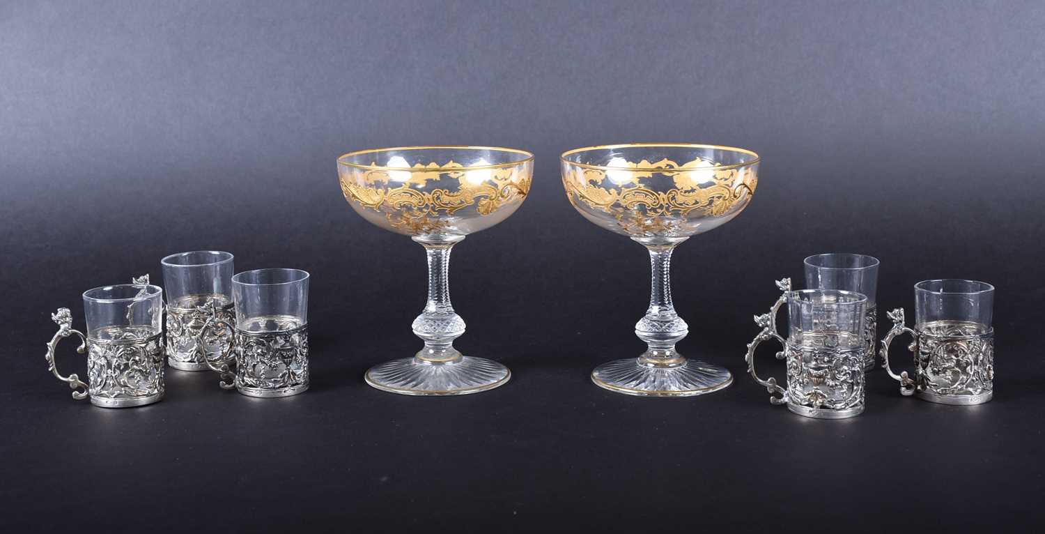 Lot 269 - A pair of Continental glass champagne bowls in...