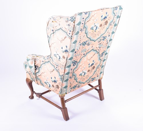 Lot 97 - A Georgian style mahogany wing armchair,...
