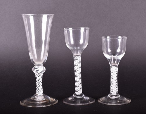 Lot 459 - An 18th century ale glass, with tall, round...