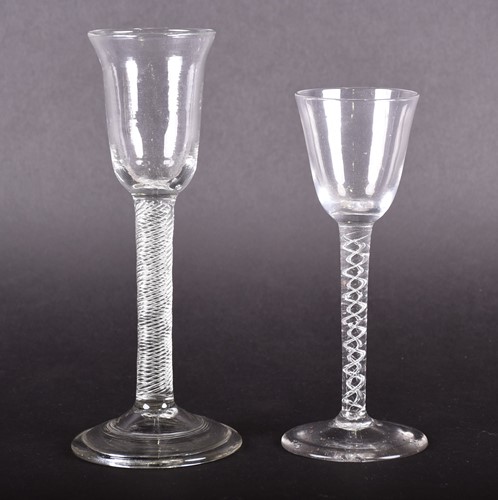 Lot 457 - An 18th century tall wine glass with bell bowl,...