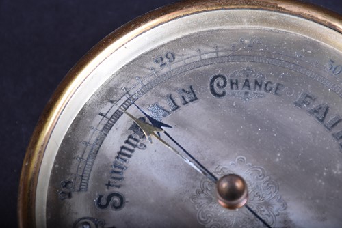 Lot 375 - A late 19th century brass cased barometer,...