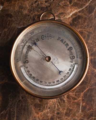 Lot 375 - A late 19th century brass cased barometer,...