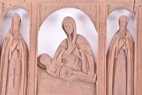 Lot 469 - A 19th century Russian carved wood icon with...