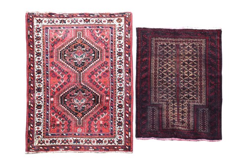 Lot 198 - An Afghan rug, 20th century, with two hooked...