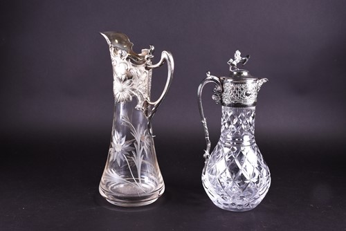 Lot 628 - An art nouveau style silver mounted wine ewer,...