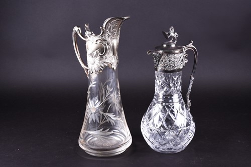 Lot 628 - An art nouveau style silver mounted wine ewer,...