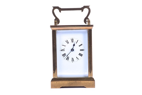 Lot 398 - A brass cased timepiece carriage clock, 20th...