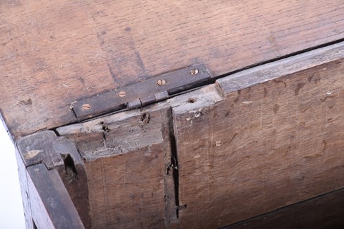 Lot 165 - An 18th century oak coffer, with a single...