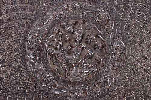 Lot 166 - An Indian carved ebony occasional table, the...
