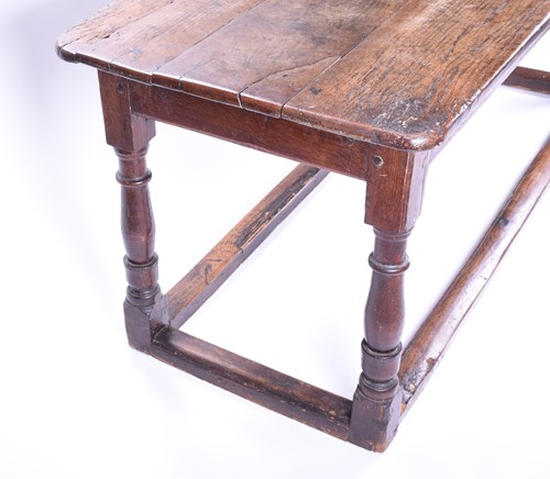 Lot 180 - A large George III oak refectory table,...