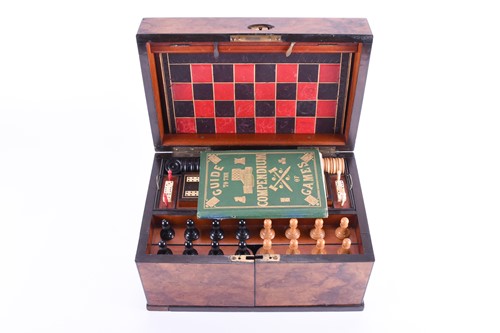 Lot 120 - A Victorian walnut veneered games compendium,...