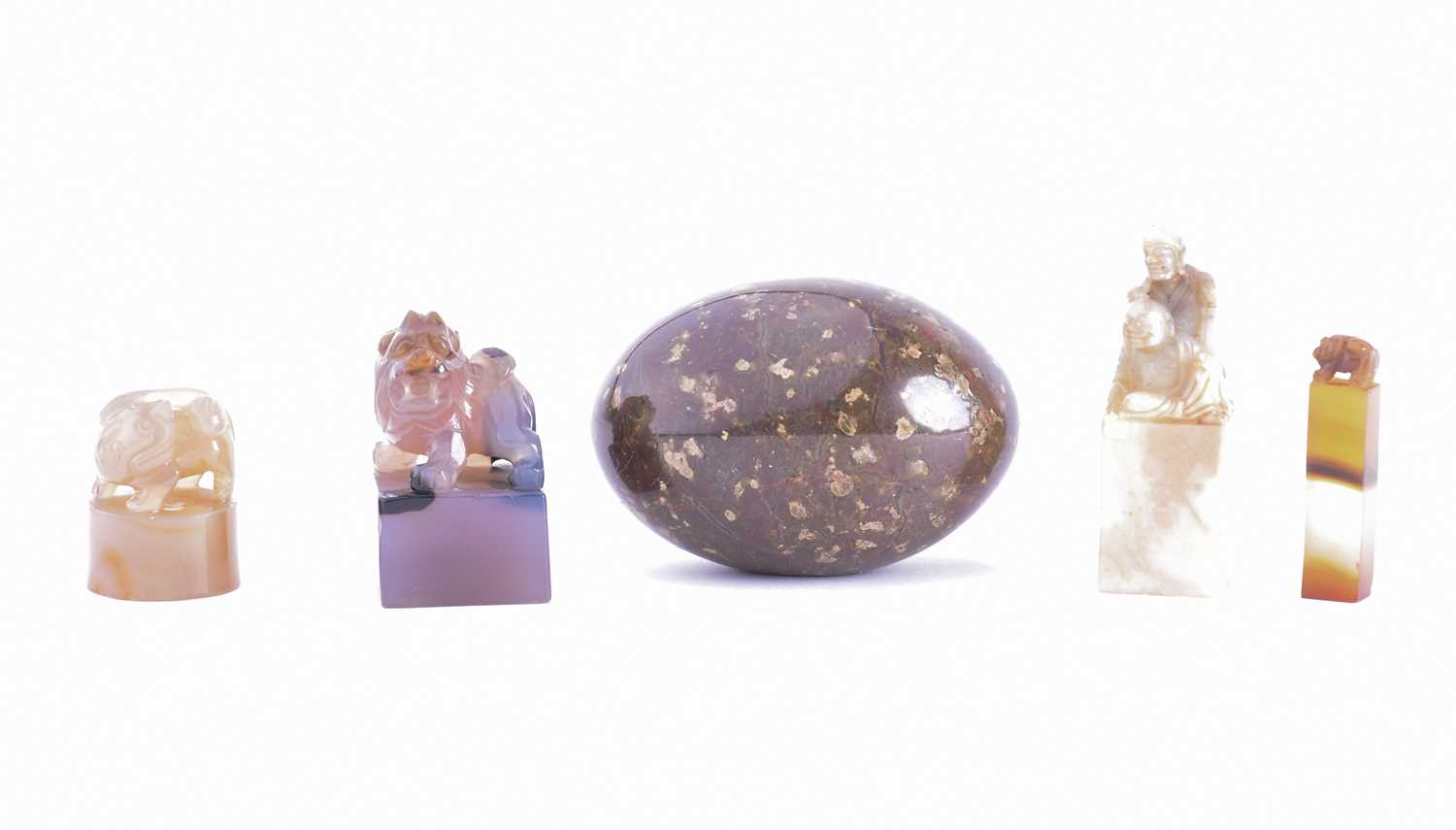 Lot 238 - Four Chinese carved agate and soapstone blank...