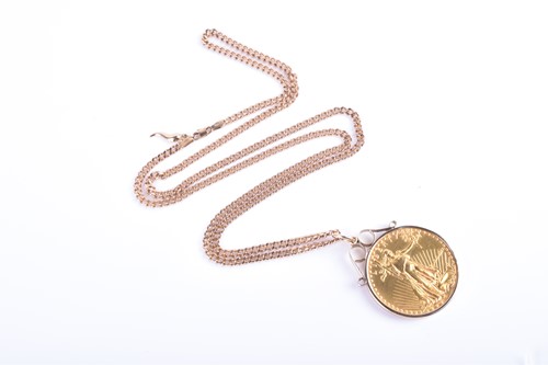 Lot 780 - An American 1oz Fine Gold 50 Dollar coin, 1986,...