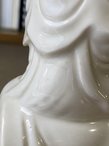 Lot 284 - A Chinese blanc de chine figure of Guanyin...