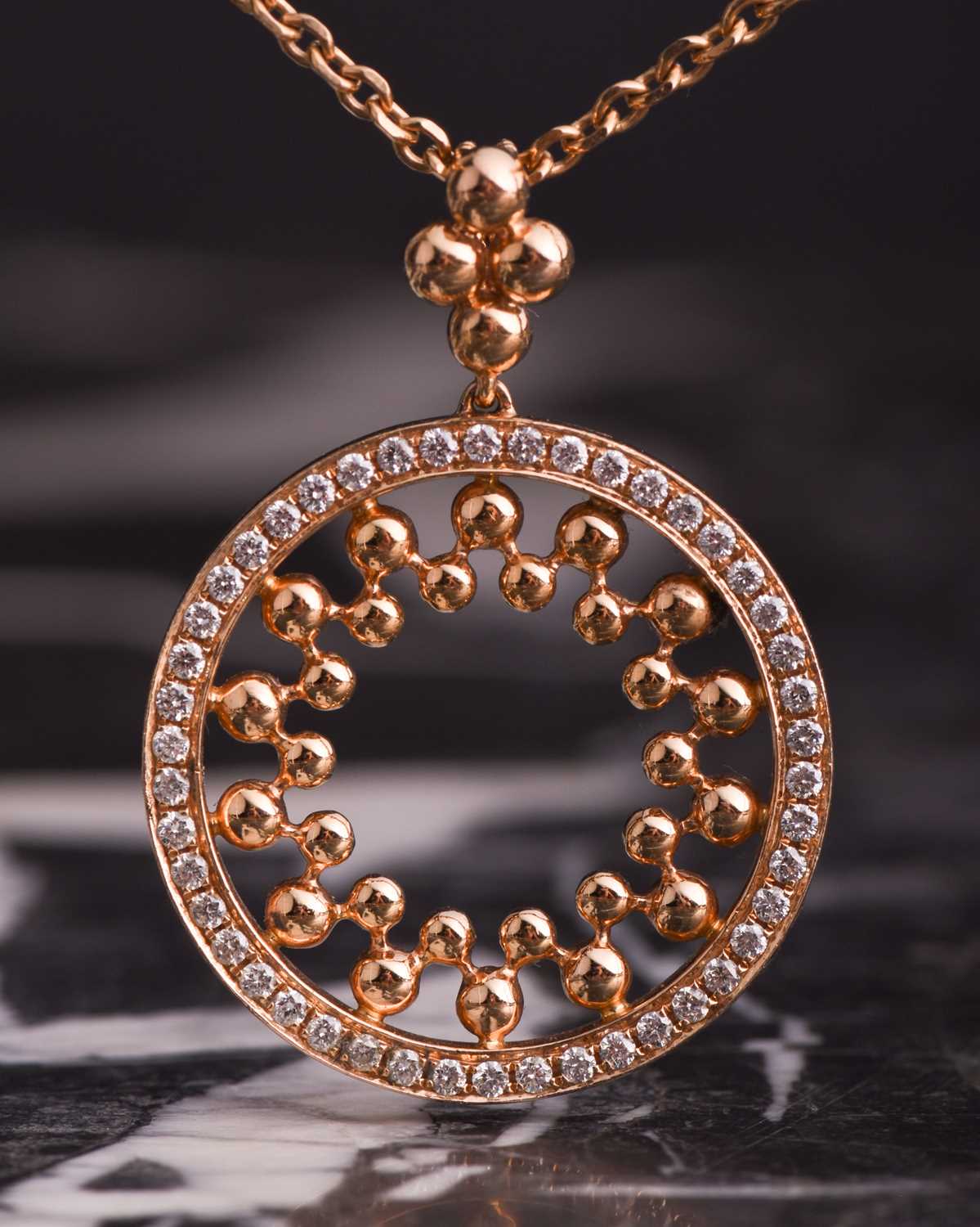 Lot 658 - Boodles. An 18ct rose gold and diamond...