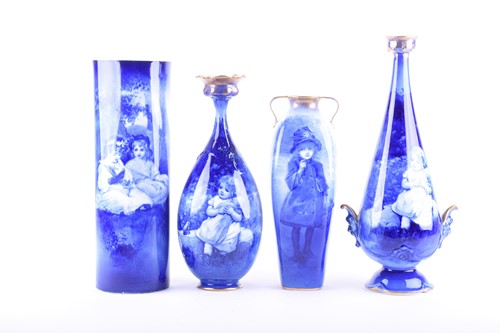 Lot 412 - Three Royal Doulton blue children series vases,...