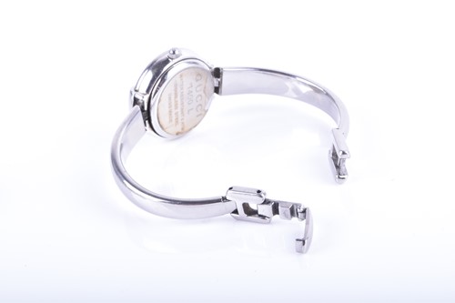 Lot 415 - Two Gucci ladies wristwatches, comprising a...