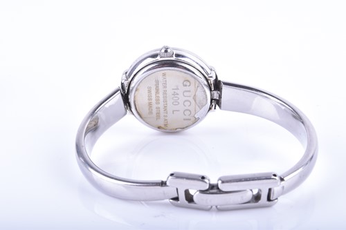 Lot 415 - Two Gucci ladies wristwatches, comprising a...