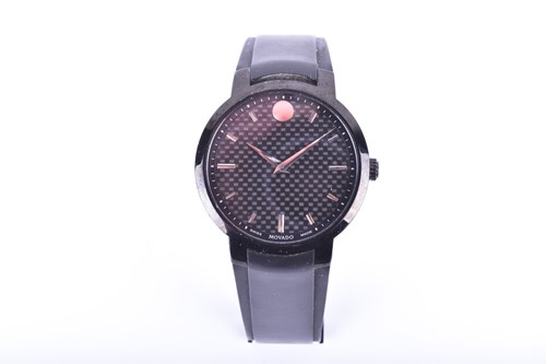 Lot 560 - A Movado carbon fibre and stainless steel...