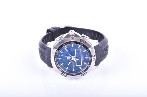 Lot 406 - A Tag Heuer Aquaracer wristwatch, the black...