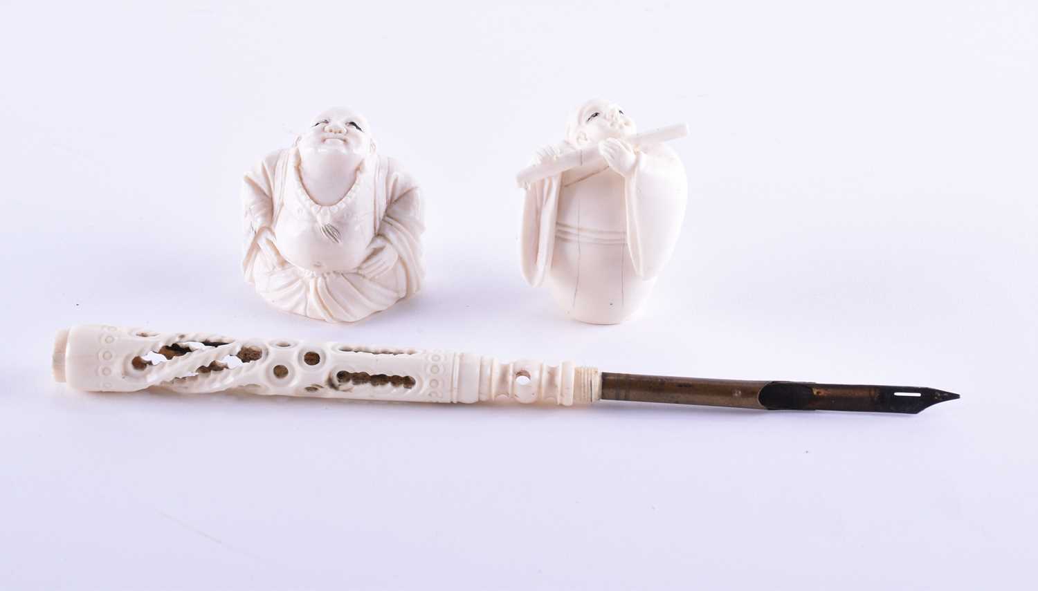 Lot 210 - Two Japanese cared ivory netsuke, late Meiji,...