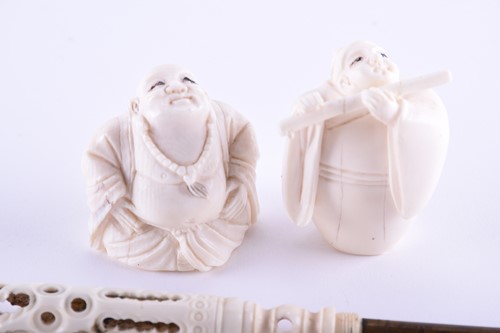 Lot 210 - Two Japanese cared ivory netsuke, late Meiji,...