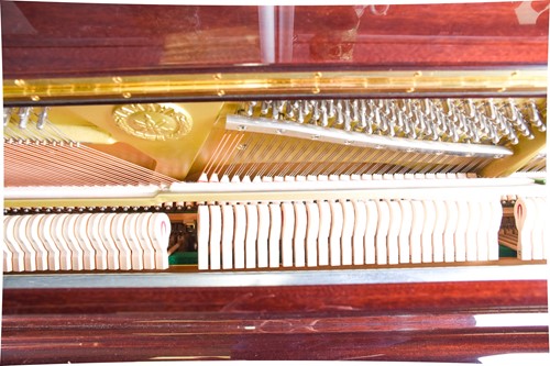 Lot 173 - A Yamaha upright piano with high gloss finish,...