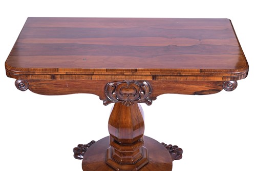 Lot 127 - A Regency rosewood foldover card table, the...