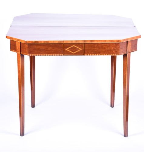 Lot 93 - A 19th century mahogany tea table, the...