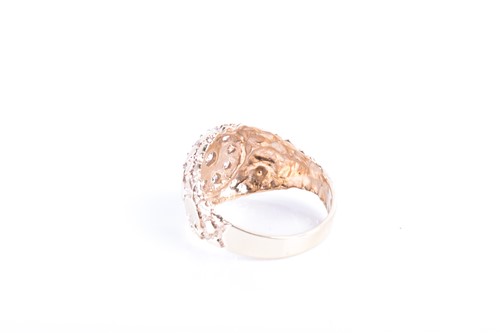 Lot 858 - A yellow metal and CZ ring set with a circular...