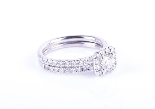 Lot 744 - A 14ct white gold and diamond ring by Hearts...