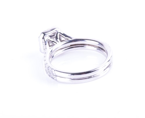 Lot 744 - A 14ct white gold and diamond ring by Hearts...