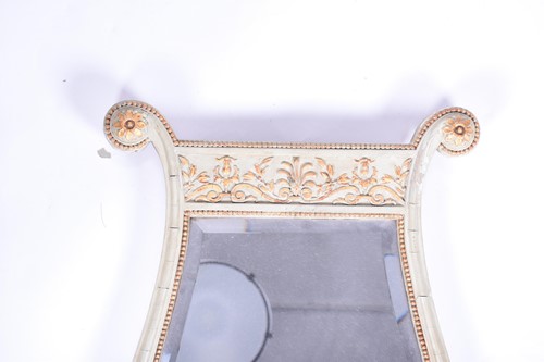 Lot 103 - A Regency style lyre-shaped wall mirror, with...