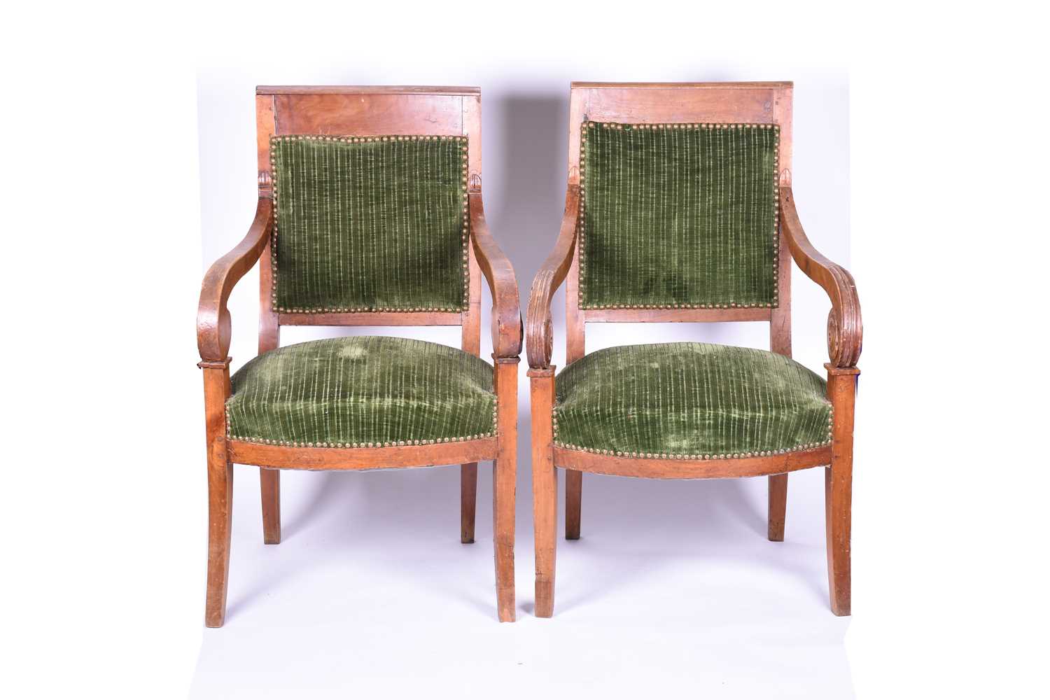 Lot 81 - A pair of Regency style walnut armchairs, with...